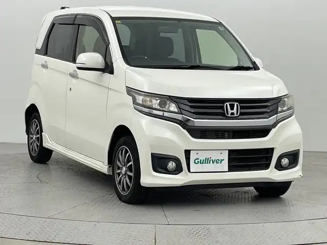 ホンダ Ｎ ＷＧＮ カスタム G 新潟県 2015(平27)年 9.8万km プレミアムホワイトパール 4WD/純正ナビ/　　ワンセグ/CD/DVD/BT/バックモニター/LEDオートライト/純正14インチアルミホイール/ステアリングスイッチ/ミラーヒーター/スマートキー/ETC