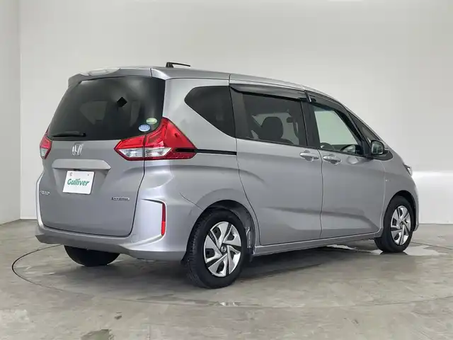 ホンダ フリード ハイブリット G ホンダセンシング 埼玉県 2019(令1)年 6.2万km ルナシルバーM 純正９インチナビ　フリップダウンモニター　バックカメラ　ビルトインＥＴＣ　ホンダセンシング　アダクティブクルーズコントロール　両側パワースライドドア　オートライト　スマートキー　ＬＥＤヘッドライト