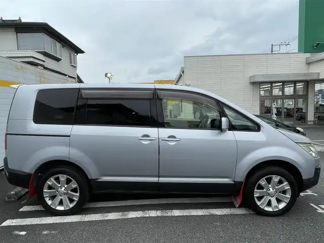 三菱 デリカＤ：５ D－Power package 埼玉県 2013(平25)年 10.3万km クールシルバーM/アイガーグレーM ディーゼル/純正ディーラーナビ/社外フリップダウン/両側パワースライド/クルコン/純正アルミ/フロアマット/バックカメラ/社外シフトノブ/JAOSマッドガード/フォグライト/シートカバー付き/スマートキー×2/スタッドレスタイヤ、アルミ付き