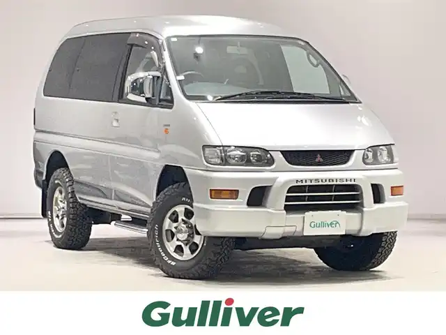 三菱 デリカ スペースギア 宮城県 2005(平17)年 8万km クールシルバーメタリック ワンオーナー/4WD/カーオーディオ/（型番：RY-390CD）/・CD/センターデフロック/アンチロック・ブレーキ・システム/ETC/純正アルミホイール/電動格納ミラー/パワーウィンドウ/3列シート/ウォークスルー/社外フロアマット/ドアバイザー/片側スライドドア