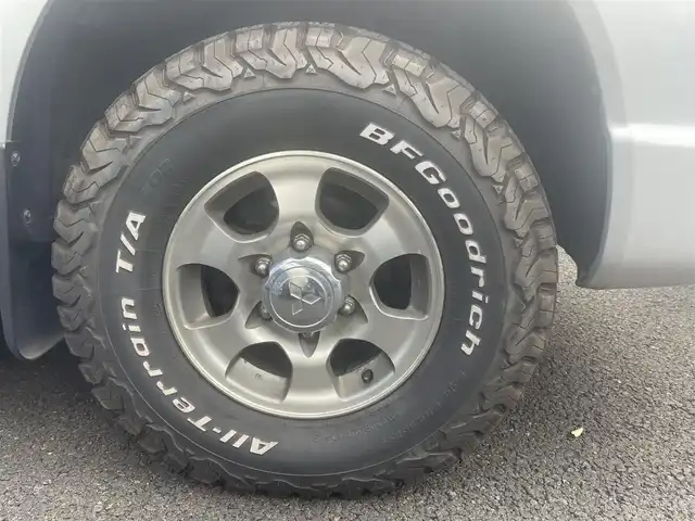 三菱 デリカ スペースギア 宮城県 2005(平17)年 8万km クールシルバーメタリック ワンオーナー/4WD/カーオーディオ/（型番：RY-390CD）/・CD/センターデフロック/アンチロック・ブレーキ・システム/ETC/純正アルミホイール/電動格納ミラー/パワーウィンドウ/3列シート/ウォークスルー/社外フロアマット/ドアバイザー/片側スライドドア