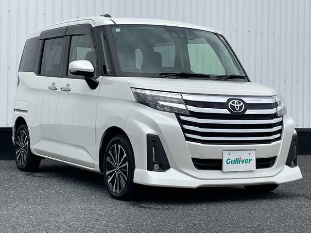 トヨタ ルーミー カスタムG－T 千葉県 2021(令3)年 2.2万km パールホワイトⅢ 社外7インメモリチナビ/(フルセグTV/BT/CD/DVD/FM/AM)/ドライブレコーダー前後/衝突被害軽減システム/車線逸脱警報/バックカメラ/追従式クルーズコントロール/両側パワースライドドア/横滑り防止装置/ETC/アイドリングストップ/LEDヘッドライト/フォグランプ/オートライト/ウィンカーミラー/電動格納ミラー/純正15インチAW/シートヒーター/シートリフター/ブレーキホールド/電子制御パーキング/プッシュスタート/スマートキー/フロアマット/取扱説明書/保証書