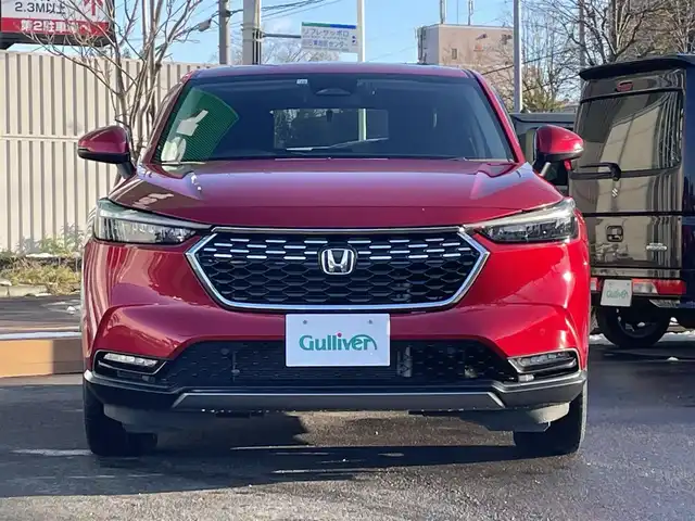 ホンダ ヴェゼル ハイブリッド e:HEV X 道央・札幌 2022(令4)年 2.3万km プレミアムクリスタルレッドM ・４WD/・衝突軽減ブレーキ/・寒冷地仕様/・純正ディスプレイオーディオ/　BT＆USB＆TV/・バックカメラ/・コーナーセンサー/・レーンキープアシスト/・レーダークルーズコントロール/・置くだけ充電/・シートヒーター/・ミラーヒーター/・オートエアコン/・オートライト/・電動格納ミラー/・ダウンヒルアシスト/・プッシュスタート/・スマートキー/・ワイパーデアイサー/・パドルシフト/・ビルトインETC/・純正フロアマット/・ドアバイザー/・ウィンカーミラー/・フォグライト/・LEDヘッドライト