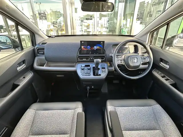 ホンダ フリード ハイブリット e:HEV AIR EX 愛媛県 2025(令7)年 0.1万km クリスタルブラックパール ホンダセンシング/クリアランスソナー/純正15インチアルミホイール/両側パワースライドドア/アダプティブクルーズコントロール/ブラインドスポットモニター/ハーフレザーシート/シートヒーター/前後コーナーセンサー/オートマチックハイビーム/LEDヘッドライト/スマートキー