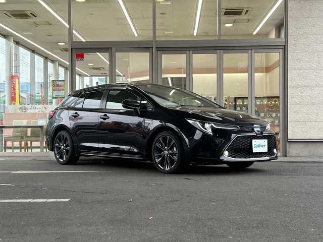 トヨタ カローラツーリング ハイブリッド ダブルバイビー 埼玉県 2019(令1)年 2万km スパークリングブラックパールクリスタルシャイン Toyota Safety Sense/〇プリクラッシュセーフティ/〇レーントレーシングアシスト/〇レーンディパーチャーアラート/〇レーダークルーズコントロール/〇オートマチックハイビーム/〇ロードサインアシスト/〇ドライバー異常時対応システム/〇プロアクティブドライビングアシスト/〇発進遅れ告知機能/エアバッグ(W+サイド)/カーテンエアバッグ/純正ナビ/シートヒーター/取扱説明書/保証書