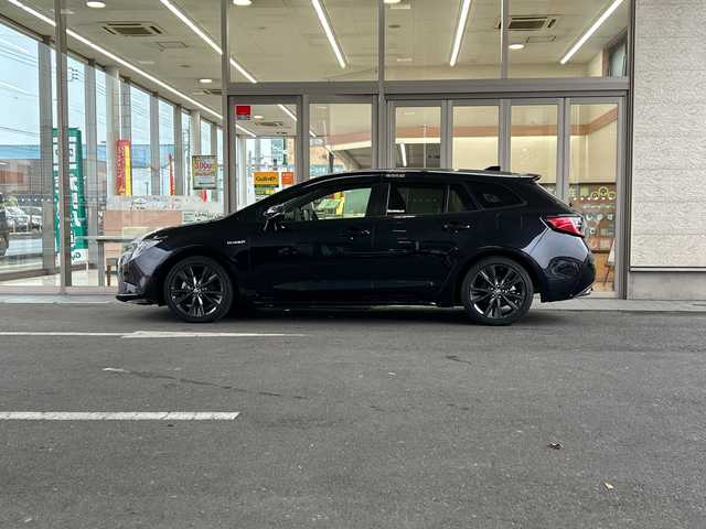トヨタ カローラツーリング ハイブリッド ダブルバイビー 埼玉県 2019(令1)年 2万km スパークリングブラックパールクリスタルシャイン Toyota Safety Sense/〇プリクラッシュセーフティ/〇レーントレーシングアシスト/〇レーンディパーチャーアラート/〇レーダークルーズコントロール/〇オートマチックハイビーム/〇ロードサインアシスト/〇ドライバー異常時対応システム/〇プロアクティブドライビングアシスト/〇発進遅れ告知機能/エアバッグ(W+サイド)/カーテンエアバッグ/純正ナビ/シートヒーター/取扱説明書/保証書