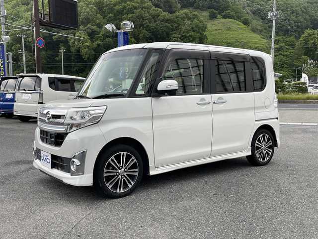 ダイハツ タント カスタム RS 山形県 2015(平27)年 9.4万km パールホワイトⅢ (株)IDOMが運営する【じしゃロン山形店】の自社ローン専用車両になります。/こちらは現金またはオートローンご利用時の価格です。/自社ローンご希望の方は別途その旨お申付け下さい。/Carrozzeriaナビ/（DTV/CD/DVD/FM/AM/Bluetooth）/両側パワースライドドア/ドラレコ/バックカメラ/ETC/ハーフレザー/アイドリングストップ/ステアリングスイッチ/電格ウィンカーミラー/後席サンシェード/D席背面ポケット/フォグランプ/純正フロアマット/横滑り防止/衝突軽減/ISOFIX