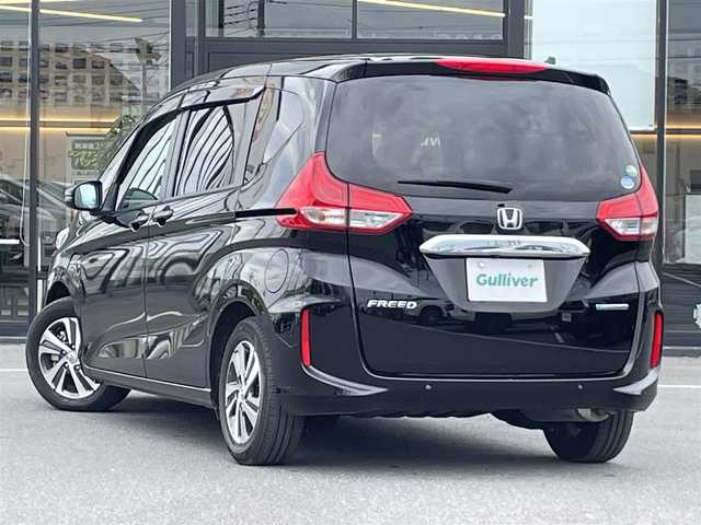 ホンダ フリード ハイブリット G ホンダセンシング 茨城県 2020(令2)年 2万km クリスタルブラックパール 純正ナビ/【ＣＤ・ＤＶＤ・ＳＤ・AM・FM・TV・BT・USB・AUX・iPod】/シートヒーター/レーダークルコン/ETC/Ｂカメラ/前後ドラレコ/後方コーナーセンサー/ステリモ/両側パワスラ/オートライト/LEDライト/純正フロアマット/純正アルミホイール/横滑り防止装置/レーンキープアシスト/衝突被害軽減システム