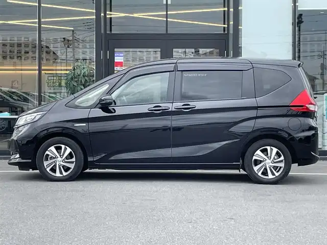ホンダ フリード ハイブリット G ホンダセンシング 茨城県 2020(令2)年 2万km クリスタルブラックパール 純正ナビ/【ＣＤ・ＤＶＤ・ＳＤ・AM・FM・TV・BT・USB・AUX・iPod】/シートヒーター/レーダークルコン/ETC/Ｂカメラ/前後ドラレコ/後方コーナーセンサー/ステリモ/両側パワスラ/オートライト/LEDライト/純正フロアマット/純正アルミホイール/横滑り防止装置/レーンキープアシスト/衝突被害軽減システム