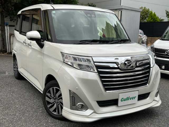 ダイハツ トール カスタムG リミテッド SAⅢ 東京都 2019(平31)年 2.8万km パールホワイトⅢ 登録時走行27987km/スマートアシスト3/・衝突回避支援ブレーキ機能/・衝突警報機能/・車線逸脱警報機能/・誤発進抑制制御機能/・先行車発進お知らせ機能/・オートハイビーム/・コーナーセンサー/クルーズコントロール/社外メモリーナビ・フルセグTV/パノラマモニター/ビルトインETC/両側パワースライドドア/LEDライト/ドライブレコーダー/スマートキー/前席シートヒーター/フロントスポイラー/パーソナルテーブル/R2.4.6年記録簿/保証書・取説/スペアキー