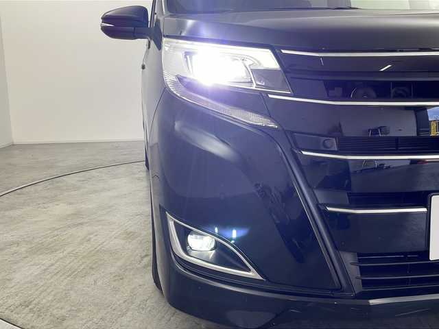 トヨタ ノア ハイブリッド G 群馬県 2021(令3)年 5.8万km ブラック 純正ナビ バックカメラ　衝突被害軽減ブレーキ　クルーズコントロール　前席シートヒーター　両側電動スライドドア　純正ビルトインETC2.0 LED ステアリングリモコン　ウッドコンビハンドル 禁煙車