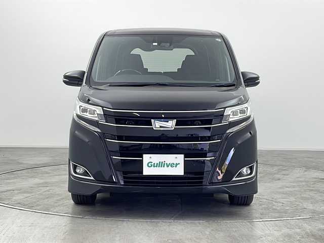 トヨタ ノア ハイブリッド G 群馬県 2021(令3)年 5.8万km ブラック 純正ナビ バックカメラ　衝突被害軽減ブレーキ　クルーズコントロール　前席シートヒーター　両側電動スライドドア　純正ビルトインETC2.0 LED ステアリングリモコン　ウッドコンビハンドル 禁煙車