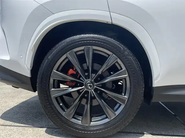 レクサス ＮＸ 350h Fスポーツ 東京都 2022(令4)年 1.5万km ホワイトノーヴァガラスフレーク ワンオーナー/パノラマルーフ/赤黒レザー/HUD/パワーバックドア/オレンジキャリパー/純正ナビ/TV/360°カメラ /スマートキー