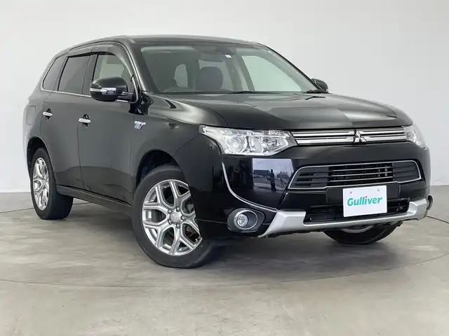 三菱 アウトランダー ＰＨＥＶ G ナビパッケージ 新潟県 2015(平27)年 8.9万km アメジストブラック 純正ディーラーOPナビ/バック/サイドカメラ/フルセグTV/Bluetooth/ETC/クルーズコントロール/電動リアゲート/パドルシフト/革巻きステアリング/ステアリングスイッチ/HIDヘッドライト/オートライト/プッシュスタート/純正フロアマット/スタッドレス付き社外AW積込み/充電ケーブル積込み