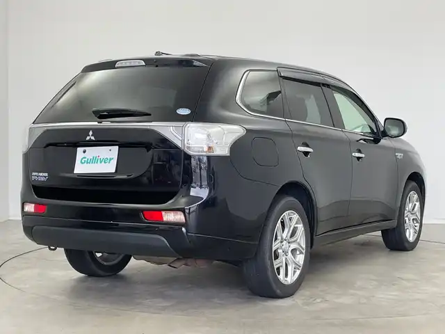 三菱 アウトランダー ＰＨＥＶ G ナビパッケージ 新潟県 2015(平27)年 8.9万km アメジストブラック 純正ディーラーOPナビ/バック/サイドカメラ/フルセグTV/Bluetooth/ETC/クルーズコントロール/電動リアゲート/パドルシフト/革巻きステアリング/ステアリングスイッチ/HIDヘッドライト/オートライト/プッシュスタート/純正フロアマット/スタッドレス付き社外AW積込み/充電ケーブル積込み