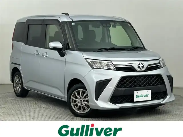 トヨタ ルーミー G 道央・札幌 2020(令2)年 0.9万km ブライトシルバーM ・4WD/・寒冷地仕様/・スマートアシスト/・衝突被害軽減ブレーキ/・レーンキープアシスト/・純正オーディオ/・CD/FM/AUX/USB/・両側パワースライドドア/・ドアロック連動ミラー/・アイドリングストップ/・コーナーセンサー/・横滑り防止装置/・オートライト/・オートエアコン/・プッシュスタート/・スマートキー/・LEDヘッドライト
