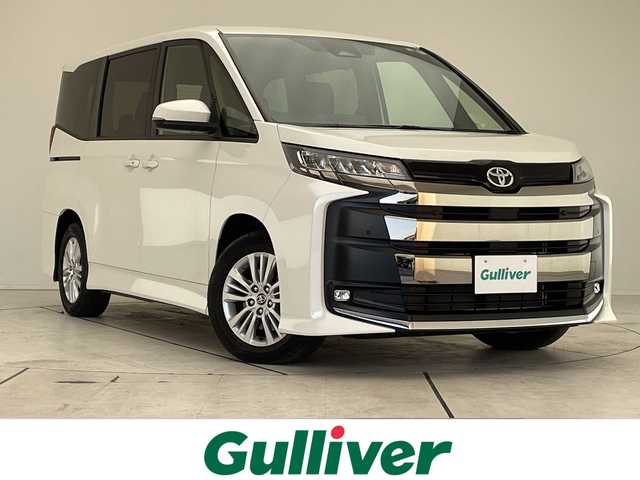 トヨタ ノア S－G 愛知県 2022(令4)年 1.5万km ホワイトパールクリスタルシャイン 純正ディズプレイオーディオナビ/両側パワースライドドア/ユニバーサルステップ/シートヒーター/バックカメラ/コーナーセンサー/純正アルミホイール/ETC2.0/LEDヘッドライト/リアオートエアコン/レーンキープアシスト/オートマチックハイビーム/衝突軽減システム/Bluetooth/ステアリングスイッチ/スマートキー/プッシュスタート