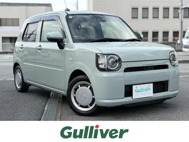 ダイハツ ミラ トコット X SA Ⅲ 三重県 2019(平31)年 8.4万km セラミックグリーンM スマートアシストIII /　・衝突警報機能(対車両・対歩行者)/　・衝突回避支援ブレーキ機能(対車両・対歩行者)/　・誤発進抑制制御機能(前方・後方)/　・車線逸脱警報機能/　・先行車発進お知らせ機能/　・オートハイビーム/純正オーディオ　/　・Bluetooth/　・CD再生/　・USB/　・AUX/スマートキーx２本/コーナーセンサー/アイドリングストップ/LEDヘッドライト/オートリトラクタブルミラー/ステアリングスイッチ/純正フロアマット/ドアバイザー/ライトレベリング/プライバシーガラス/ルーフアンテナ/横滑り防止機能/サイド/カーテンエアバック