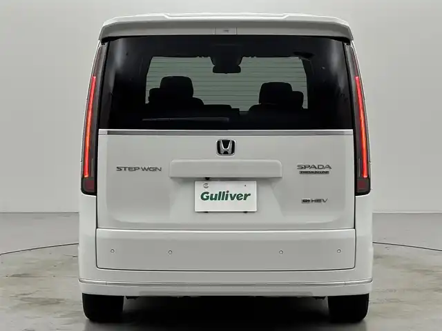 ホンダ ステップワゴン スパーダ eHEV プレミアムライン 福岡県 2025(令7)年 0.1万km プラチナホワイトパール 社外ナビ　/レーダークルーズコントロール　/ＢＳＭ　/衝突軽減　/レーンキープ　/コーナーセンサー　/アクセル踏み間違い防止　/横滑り防止　/パワーバックドア　/シートヒーター　/純正１７インチＡＷ　/Ｗエアコン　/ＬＥＤ/オートライト