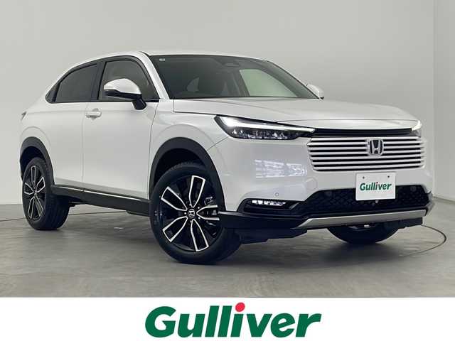 ホンダ ヴェゼル ハイブリッド e:HEV Z 三重県 2025(令7)年 0.1万km未満 プラチナホワイトパール 登録済み未使用車/純正９インチディスプレイオーディオ/　フルセグTV/カープレイ/Bluetooth/ETC2.0車載器/ワイヤレス充電器/パワーバックドア/レーダークルーズコントロール/ハンドルヒーター/バックカメラ/電子パーキング/オートホールド/電格ミラー/プッシュスタート/スマートキー/スペアキー