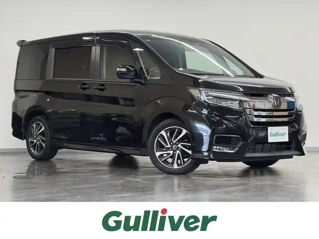 ホンダ ステップワゴン スパーダ クルスピセンシング 三重県 2018(平30)年 4.9万km プレミアムスパークルブラックパール ガソリン・ターボ/FF/MTモード付インパネCVT/純正 9インチナビ VXM-185VFNi/（CD/DVD/FM/AM/TV/SD/Music Rack/USB/iPod/Bluetooth/HDMI/後席HDMI/CarPlay）/純正 11インチ 後席モニター VM-155EN/バックカメラ/両側パワースライドドア/ドライブレコーダー 前後/ビルトイン ETC/Honda SENSING/・衝突軽減ブレーキ［CMBS］/・車線維持支援システム［LKAS］/・アダプティブクルーズコントロール［ACC］/・路外逸脱抑制機能/・先行車発進お知らせ機能/・標識認識機能/装備/・ハーフレザーシート/・シートヒーター（D/N）/・トリプルゾーン・フルオートエアコン（D/N/2nd）/・オートライト/・LED ヘッドライト＆フロントフォグランプ/・ステアリングスイッチ/・パドルシフト/・プッシュスタート/・スマートキーx1/・純正17inAW/・保/取/ナビ取/など