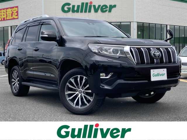 トヨタ ランドクルーザー プラド TX Lパッケージ 鳥取県 2018(平30)年 6.7万km アティチュードブラックマイカ ワンオーナー/４WD・ディーゼルターボ/７人乗り・３列シート/純正9型ナビ/フルセグ/CD/DVD/BT/USB/HDMI/バックカメラ/プリクラッシュセーフティ/レーンキープアシスト/ビルトインETC/黒レザーシート/前席パワーシート/前席シートヒーター/電動格納サードシート/レーダークルーズコントロール/LEDヘットライト/フォグライト/純正19インチアルミホイール/プッシュエンジンスタート/スマートキー×２