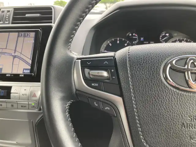 トヨタ ランドクルーザー プラド TX Lパッケージ 鳥取県 2018(平30)年 6.7万km アティチュードブラックマイカ ワンオーナー/４WD・ディーゼルターボ/７人乗り・３列シート/純正9型ナビ/フルセグ/CD/DVD/BT/USB/HDMI/バックカメラ/プリクラッシュセーフティ/レーンキープアシスト/ビルトインETC/黒レザーシート/前席パワーシート/前席シートヒーター/電動格納サードシート/レーダークルーズコントロール/LEDヘットライト/フォグライト/純正19インチアルミホイール/プッシュエンジンスタート/スマートキー×２