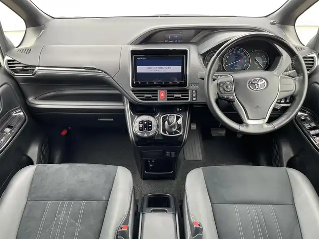 トヨタ エスクァイア ハイブリッド Gi プレミアムパッケージ 熊本県 2019(令1)年 3.9万km ホワイトパールクリスタルシャイン 純正９型ナビ/・AM/FM/CD/DVD/SD/BT/：フルセグTV/・バックカメラ/トヨタセーフティセンス/・プリクラッシュセーフティ/・レーンディパーチャアラート/・オートマチックハイビーム/・クリアランスソナー/クルーズコントロール/ウッドコンビステアリング/・ステアリングリモコン/・ステアリングヒーター/両側電動ドア/ビルトインＥＴＣ/ハーフレザーシート/・D/Nシートヒーター/前後ドライブレコーダー/LEDヘッドライト/オートライト/フォグランプ/スマートキー/スペアキー/プッシュスタート/純正フロアマット/純正ドアバイザー/純正15インチアルミホイール