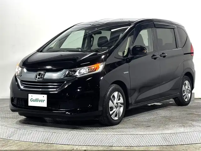 ホンダ フリード ハイブリット G ホンダセンシング 大阪府 2018(平30)年 2万km プレミアムスパークルブラックパール 純正ナビ(フルセグ/DVD再生/Bluetooth) Bカメラ ETC 両側パワースライドドア 衝突軽減 レーダークルコン レーンアシスト スマートキー Pスタート オートライト ドラレコ
