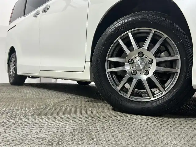 トヨタ エスクァイア ハイブリッド Gi 大阪府 2016(平28)年 4.8万km ホワイトパールクリスタルシャイン 純正10incナビTV バックカメラ 12.1incフリップダウンモニター 黒革シート シートヒーター クルーズコントロール 衝突軽減ブレーキ レーンアシスト オートハイビーム 両側パワースライドドア ドライブレコーダー ETC