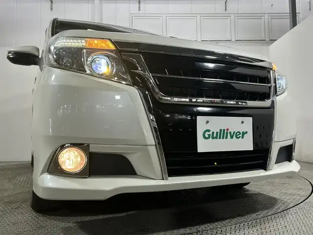 トヨタ エスクァイア ハイブリッド Gi 大阪府 2016(平28)年 4.8万km ホワイトパールクリスタルシャイン 純正10incナビTV バックカメラ 12.1incフリップダウンモニター 黒革シート シートヒーター クルーズコントロール 衝突軽減ブレーキ レーンアシスト オートハイビーム 両側パワースライドドア ドライブレコーダー ETC