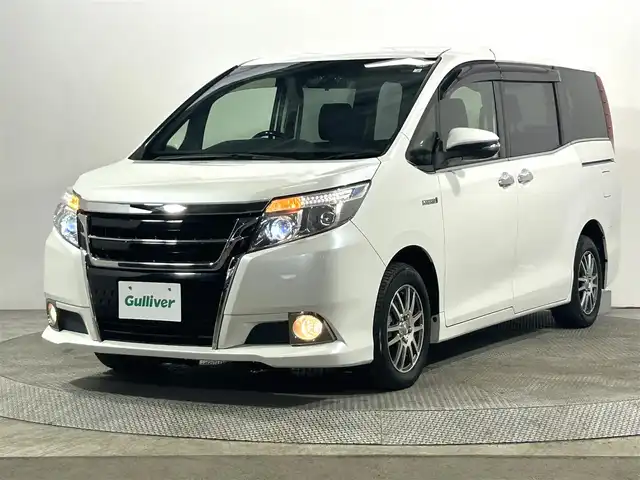 トヨタ エスクァイア ハイブリッド Gi 大阪府 2016(平28)年 4.8万km ホワイトパールクリスタルシャイン 純正10incナビTV バックカメラ 12.1incフリップダウンモニター 黒革シート シートヒーター クルーズコントロール 衝突軽減ブレーキ レーンアシスト オートハイビーム 両側パワースライドドア ドライブレコーダー ETC