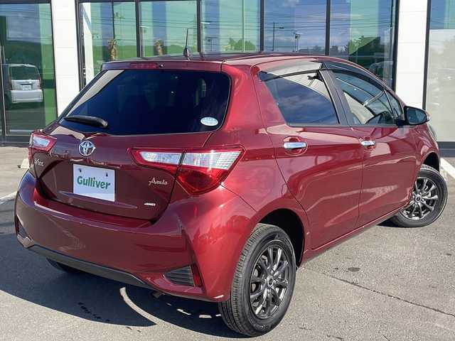 トヨタ ヴィッツ F アミー 道東・釧路十勝 2018(平30)年 6.2万km ダークレッドマイカメタリック ・４WD/・社外SDナビ/（フルセグ・DVD・CD・Bluetooth・ラジオ）/・バックカメラ/・スマートキー/・プッシュスタート/・社外前後ドライブレコーダー/・ステアリングスイッチ/・Toyota Safety Sense/・プリクラッシュセーフティ/・レーンディパーチャーアラート/・オートハイビーム/・フォグライト/・ウインカーミラー/・社外14インチアルミホイール/・保証書/・取扱説明書