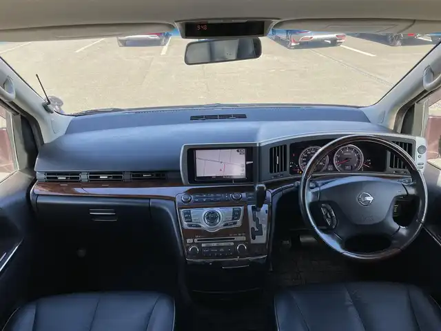 日産 エルグランド 250ハイウェイスター ブラックレザ-ナビ 道央・札幌 2008(平20)年 8.6万km ディープカシス ４WD/社外メモリーナビ/AM/FM/CD/DVD/BT/AUX/ワンセグ/社外フリップダウンモニター/コーナーセンサー/バックカメラ/フロントカメラ/両側パワースライドドア/D席パワーシート/前席シートヒーター/オットマン/レザーシート/革巻きウッドコンビステアリング/ステアリングリモコン/MTモード付AT/スマートキー/オートライト/フォグランプ/キセノンヘッドライト/電動格納ミラー/ウィンカーミラー/純正フロアマット/ドアバイザー/スペアキー