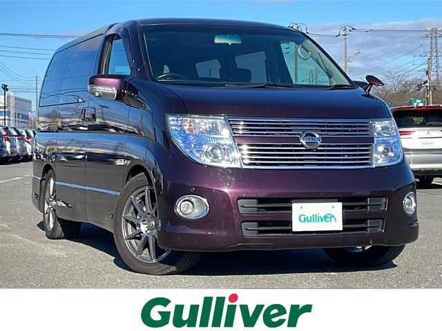 日産 エルグランド 250ハイウェイスター ブラックレザ-ナビ 道央・札幌 2008(平20)年 8.6万km ディープカシス ４WD/社外メモリーナビ/AM/FM/CD/DVD/BT/AUX/ワンセグ/社外フリップダウンモニター/コーナーセンサー/バックカメラ/フロントカメラ/両側パワースライドドア/D席パワーシート/前席シートヒーター/オットマン/レザーシート/革巻きウッドコンビステアリング/ステアリングリモコン/MTモード付AT/スマートキー/オートライト/フォグランプ/キセノンヘッドライト/電動格納ミラー/ウィンカーミラー/純正フロアマット/ドアバイザー/スペアキー