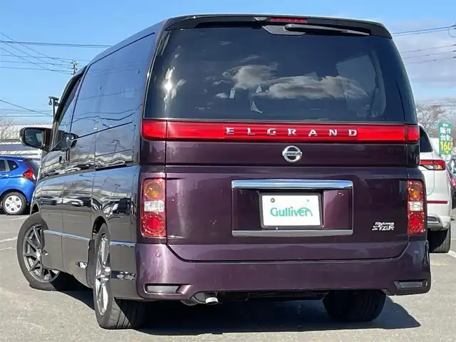 日産 エルグランド 250ハイウェイスター ブラックレザ-ナビ 道央・札幌 2008(平20)年 8.6万km ディープカシス ４WD/社外メモリーナビ/AM/FM/CD/DVD/BT/AUX/ワンセグ/社外フリップダウンモニター/コーナーセンサー/バックカメラ/フロントカメラ/両側パワースライドドア/D席パワーシート/前席シートヒーター/オットマン/レザーシート/革巻きウッドコンビステアリング/ステアリングリモコン/MTモード付AT/スマートキー/オートライト/フォグランプ/キセノンヘッドライト/電動格納ミラー/ウィンカーミラー/純正フロアマット/ドアバイザー/スペアキー