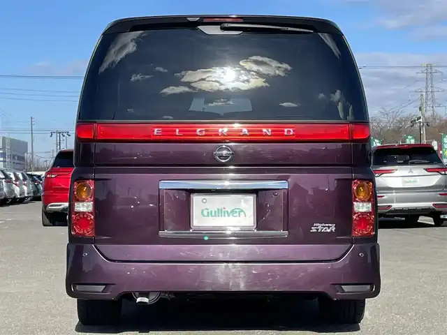 日産 エルグランド 250ハイウェイスター ブラックレザ-ナビ 道央・札幌 2008(平20)年 8.6万km ディープカシス ４WD/社外メモリーナビ/AM/FM/CD/DVD/BT/AUX/ワンセグ/社外フリップダウンモニター/コーナーセンサー/バックカメラ/フロントカメラ/両側パワースライドドア/D席パワーシート/前席シートヒーター/オットマン/レザーシート/革巻きウッドコンビステアリング/ステアリングリモコン/MTモード付AT/スマートキー/オートライト/フォグランプ/キセノンヘッドライト/電動格納ミラー/ウィンカーミラー/純正フロアマット/ドアバイザー/スペアキー