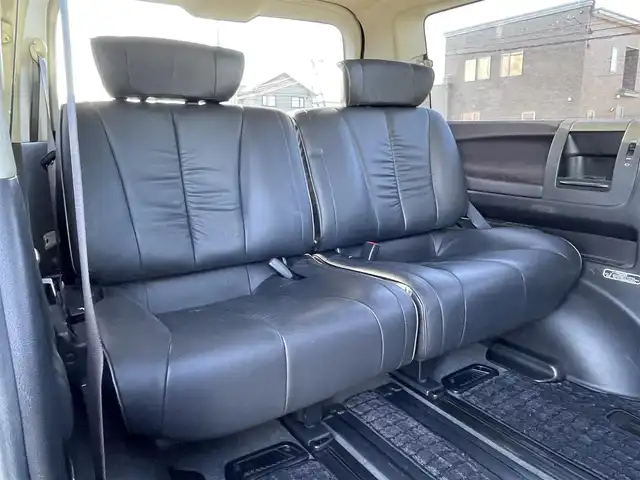 日産 エルグランド 250ハイウェイスター ブラックレザ-ナビ 道央・札幌 2008(平20)年 8.6万km ディープカシス ４WD/社外メモリーナビ/AM/FM/CD/DVD/BT/AUX/ワンセグ/社外フリップダウンモニター/コーナーセンサー/バックカメラ/フロントカメラ/両側パワースライドドア/D席パワーシート/前席シートヒーター/オットマン/レザーシート/革巻きウッドコンビステアリング/ステアリングリモコン/MTモード付AT/スマートキー/オートライト/フォグランプ/キセノンヘッドライト/電動格納ミラー/ウィンカーミラー/純正フロアマット/ドアバイザー/スペアキー