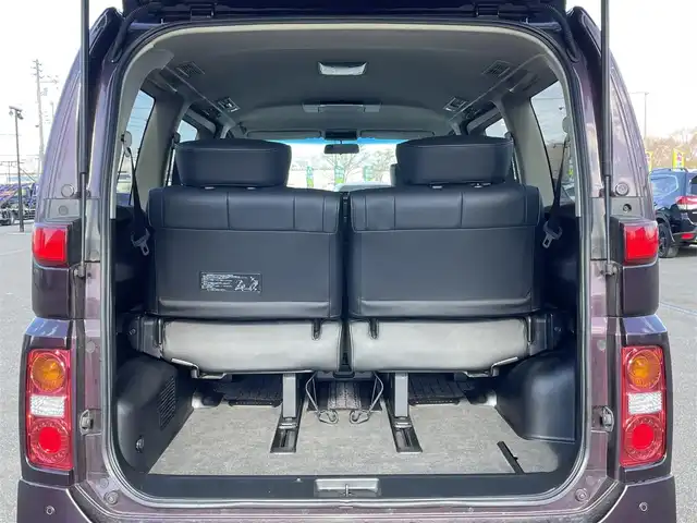 日産 エルグランド 250ハイウェイスター ブラックレザ-ナビ 道央・札幌 2008(平20)年 8.6万km ディープカシス ４WD/社外メモリーナビ/AM/FM/CD/DVD/BT/AUX/ワンセグ/社外フリップダウンモニター/コーナーセンサー/バックカメラ/フロントカメラ/両側パワースライドドア/D席パワーシート/前席シートヒーター/オットマン/レザーシート/革巻きウッドコンビステアリング/ステアリングリモコン/MTモード付AT/スマートキー/オートライト/フォグランプ/キセノンヘッドライト/電動格納ミラー/ウィンカーミラー/純正フロアマット/ドアバイザー/スペアキー