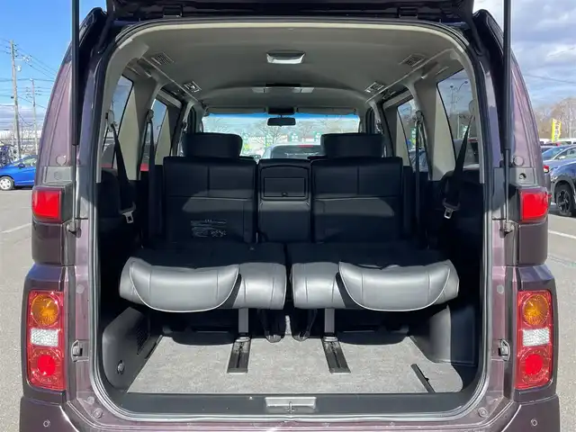 日産 エルグランド 250ハイウェイスター ブラックレザ-ナビ 道央・札幌 2008(平20)年 8.6万km ディープカシス ４WD/社外メモリーナビ/AM/FM/CD/DVD/BT/AUX/ワンセグ/社外フリップダウンモニター/コーナーセンサー/バックカメラ/フロントカメラ/両側パワースライドドア/D席パワーシート/前席シートヒーター/オットマン/レザーシート/革巻きウッドコンビステアリング/ステアリングリモコン/MTモード付AT/スマートキー/オートライト/フォグランプ/キセノンヘッドライト/電動格納ミラー/ウィンカーミラー/純正フロアマット/ドアバイザー/スペアキー