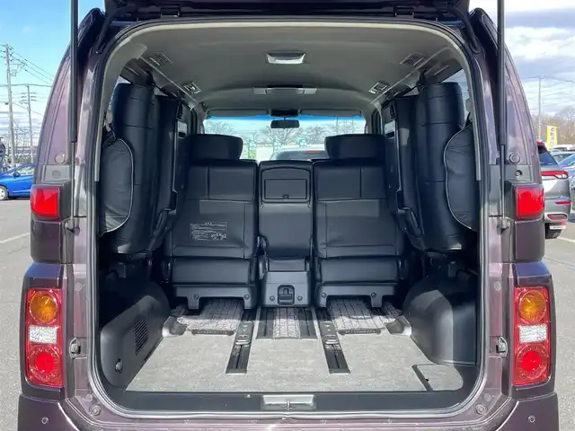 日産 エルグランド 250ハイウェイスター ブラックレザ-ナビ 道央・札幌 2008(平20)年 8.6万km ディープカシス ４WD/社外メモリーナビ/AM/FM/CD/DVD/BT/AUX/ワンセグ/社外フリップダウンモニター/コーナーセンサー/バックカメラ/フロントカメラ/両側パワースライドドア/D席パワーシート/前席シートヒーター/オットマン/レザーシート/革巻きウッドコンビステアリング/ステアリングリモコン/MTモード付AT/スマートキー/オートライト/フォグランプ/キセノンヘッドライト/電動格納ミラー/ウィンカーミラー/純正フロアマット/ドアバイザー/スペアキー