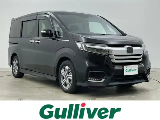 ホンダ ステップワゴン スパーダ eHEV G ホンダS 岡山県 2021(令3)年 5万km プレミアムスパークルブラックパール 純正１０インチナビ　(VXU-227SWi)/【CD/DVD/USB/HDMI/フルセグ】/バックカメラ　/両側電動スライド　/レーダークルーズコントロール　/ビルトインＥＴＣ２．０　/ＬＥＤヘッドライト　/ドライブレコーダー　前後/オートハイビーム　/アイドリングストップ　/フォグランプ/禁煙車/オートブレーキホールド/純正アルミ/純正フロアマット