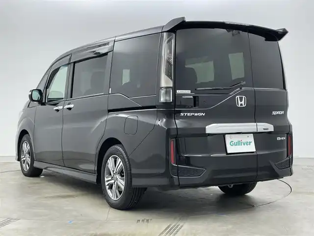 ホンダ ステップワゴン スパーダ eHEV G ホンダS 岡山県 2021(令3)年 5万km プレミアムスパークルブラックパール 純正１０インチナビ　(VXU-227SWi)/【CD/DVD/USB/HDMI/フルセグ】/バックカメラ　/両側電動スライド　/レーダークルーズコントロール　/ビルトインＥＴＣ２．０　/ＬＥＤヘッドライト　/ドライブレコーダー　前後/オートハイビーム　/アイドリングストップ　/フォグランプ/禁煙車/オートブレーキホールド/純正アルミ/純正フロアマット