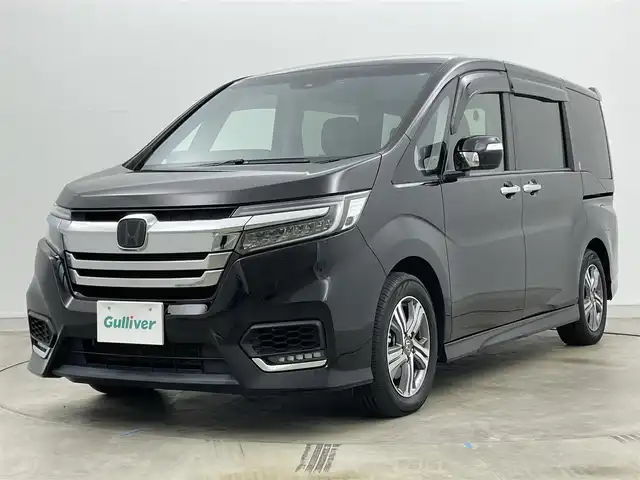 ホンダ ステップワゴン スパーダ eHEV G ホンダS 岡山県 2021(令3)年 5万km プレミアムスパークルブラックパール 純正１０インチナビ　(VXU-227SWi)/【CD/DVD/USB/HDMI/フルセグ】/バックカメラ　/両側電動スライド　/レーダークルーズコントロール　/ビルトインＥＴＣ２．０　/ＬＥＤヘッドライト　/ドライブレコーダー　前後/オートハイビーム　/アイドリングストップ　/フォグランプ/禁煙車/オートブレーキホールド/純正アルミ/純正フロアマット