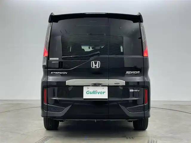 ホンダ ステップワゴン スパーダ eHEV G ホンダS 岡山県 2021(令3)年 5万km プレミアムスパークルブラックパール 純正１０インチナビ　(VXU-227SWi)/【CD/DVD/USB/HDMI/フルセグ】/バックカメラ　/両側電動スライド　/レーダークルーズコントロール　/ビルトインＥＴＣ２．０　/ＬＥＤヘッドライト　/ドライブレコーダー　前後/オートハイビーム　/アイドリングストップ　/フォグランプ/禁煙車/オートブレーキホールド/純正アルミ/純正フロアマット