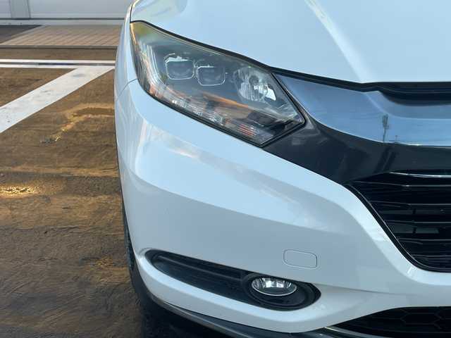 ホンダ ヴェゼル ハイブリッド X Lパッケージ 長野県 2014(平26)年 12.1万km ホワイトオーキッドパール 【(株)IDOMが運営する【じしゃロン長野店】の自社ローン対象車両になります。こちらは現金ご利用時の価格です。自社ローンご希望の方は別途その旨お申付け下さい。/社外ナビ/バックカメラ/ステアリングスイッチ/クルーズコントロール/シートヒーター/純正フロアマット/純正アルミホイール