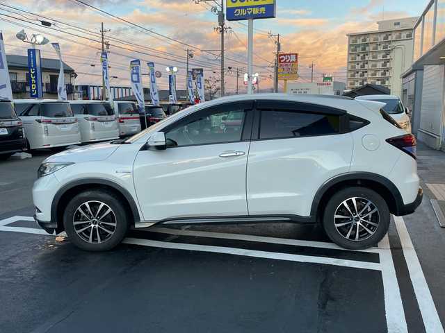 ホンダ ヴェゼル ハイブリッド X Lパッケージ 長野県 2014(平26)年 12.1万km ホワイトオーキッドパール 【(株)IDOMが運営する【じしゃロン長野店】の自社ローン対象車両になります。こちらは現金ご利用時の価格です。自社ローンご希望の方は別途その旨お申付け下さい。/社外ナビ/バックカメラ/ステアリングスイッチ/クルーズコントロール/シートヒーター/純正フロアマット/純正アルミホイール