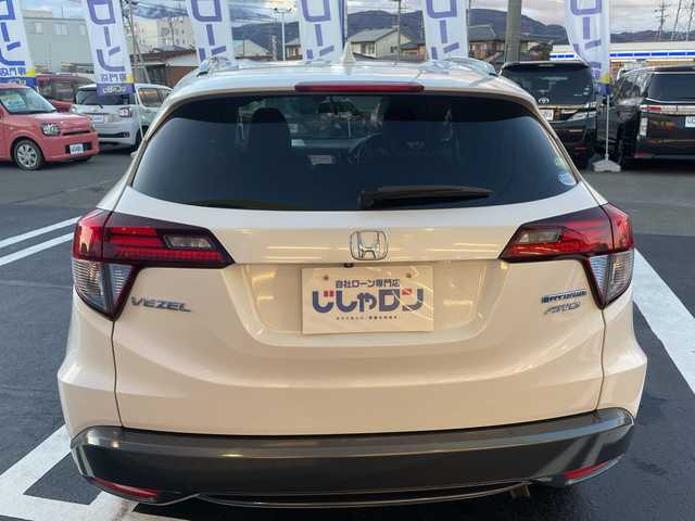 ホンダ ヴェゼル ハイブリッド X Lパッケージ 長野県 2014(平26)年 12.1万km ホワイトオーキッドパール 【(株)IDOMが運営する【じしゃロン長野店】の自社ローン対象車両になります。こちらは現金ご利用時の価格です。自社ローンご希望の方は別途その旨お申付け下さい。/社外ナビ/バックカメラ/ステアリングスイッチ/クルーズコントロール/シートヒーター/純正フロアマット/純正アルミホイール