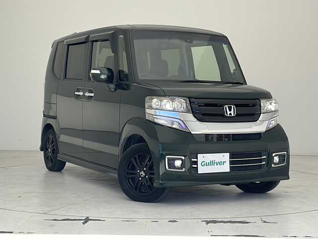 ホンダ Ｎ ＢＯＸ カスタム SSブラックSパッケージ 沖縄県 2016(平28)年 7.7万km ブリティッシュグリーンP 禁煙車　/純正ナビ【VXM-174CSI】/（Bluetooth　TV　CD　AM　FM）　/両側パワースライドドア　/バックカメラ　/シートヒーター　/オートエアコン　/スマートキー　/後席サンシェード　/チップアップシート　/純正アルミ　/純正フロアマット/プッシュスタート/スマートキー/ベンチシート/電動格納ミラー