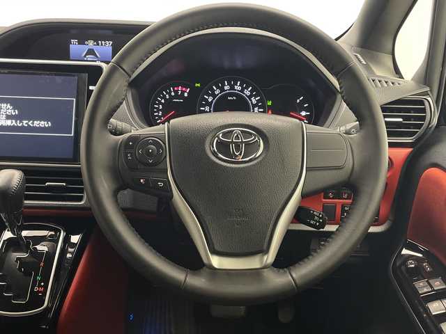 トヨタ ヴォクシー ZS 宮崎県 2017(平29)年 5.3万km イナズマスパーキングブラックガラスフレーク トヨタセーフティセンス/モデリスタエアロ（Ｆ，Ｓ，Ｒ）/純正10インチナビ　/フルセグＴＶ　/フリップダウンモニター（12インチ）/両側パワースライドドア/バックカメラ/クルーズコントロール/LEDヘッドライト/オートハイビーム/レーンキープアシスト/ビルトインＥＴＣ/スペアキー/プッシュスタート